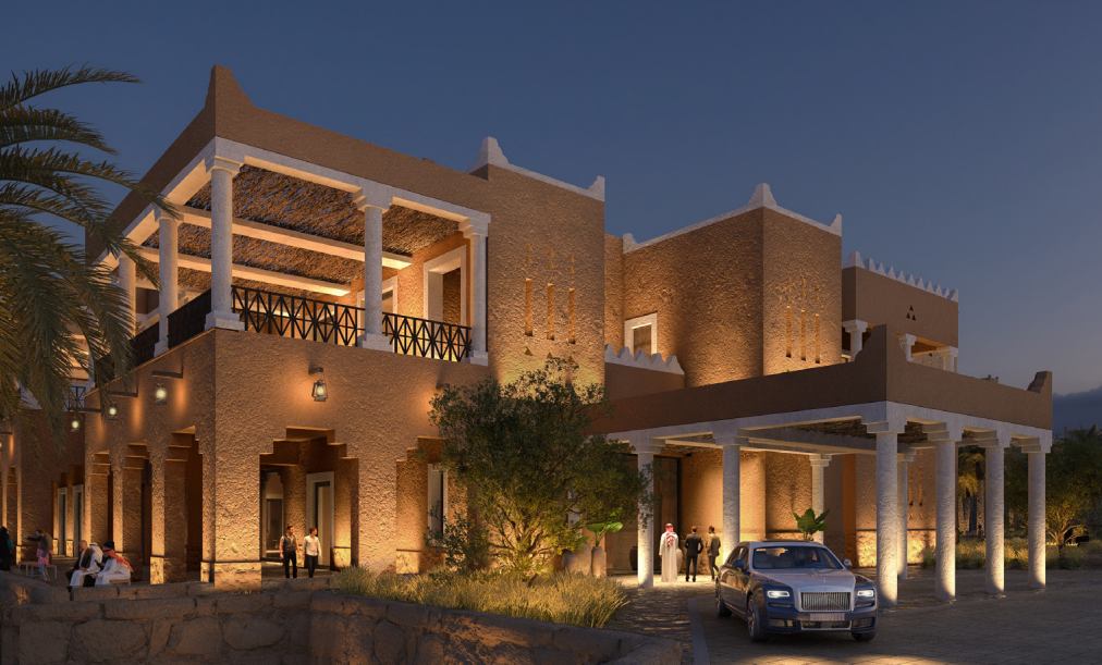 Exterior view of a Saudi Najdi-style building showcasing custom GRC façade elements, decorative columns, and traditional architectural details illuminated with warm lighting