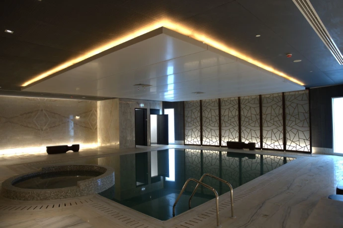 Hotel pool with premium GRG ceilings, joinery, and integrated lighting